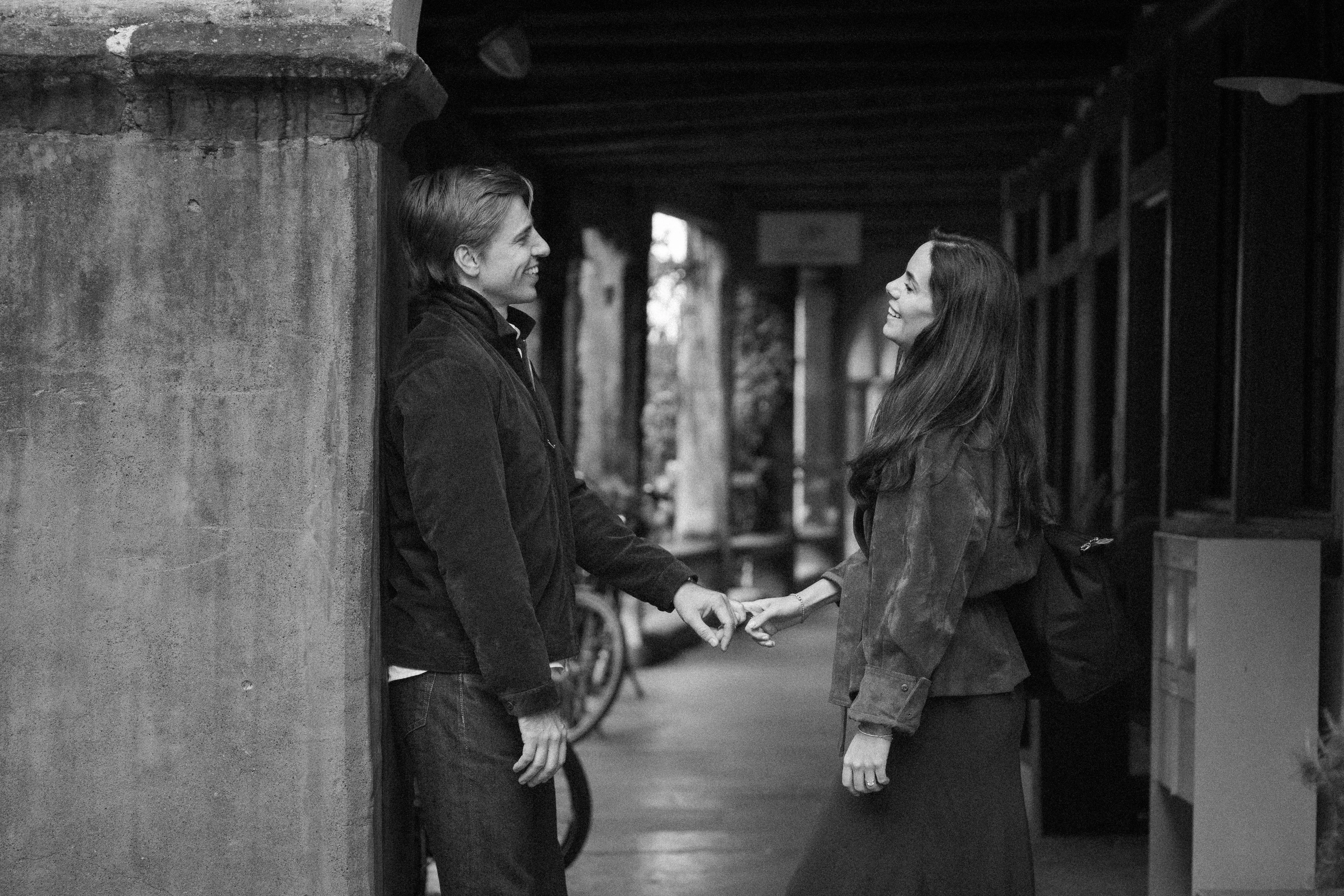 Editorial couple portrait with a quiet cinematic mood